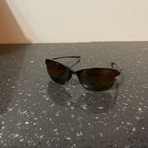 Polarized Oakley Women’s Unstoppable sunglasses.